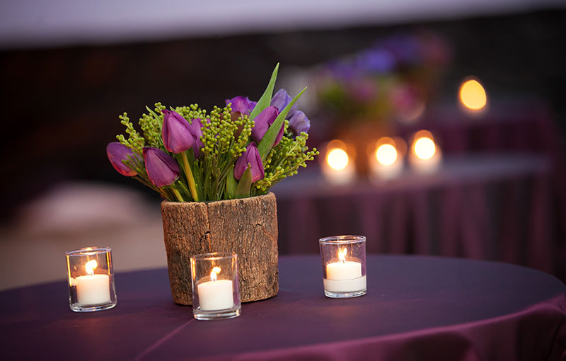 Cocktail Table with Flower Arrangement and Candles